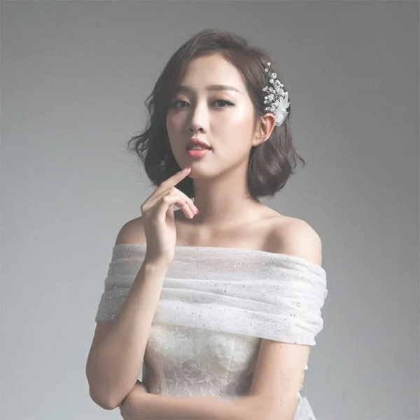 Top 10 kiểu tóc cô dâu mặt vuông thêm xinh - 54 Top 10 kiểu tóc cô dâu mặt vuông thêm xinh - 53