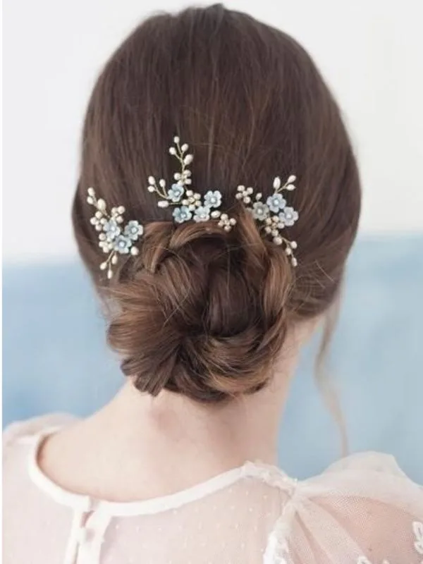 Bật Mí 5 Kiểu Tóc Cho Cô Dâu Mặt Trái Xoan - 60